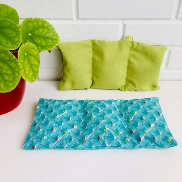 Bouillotte sèche graines de lin, motifs plumeau turquoise