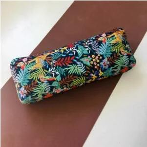 Bolster ovale motifs jungle fond bleu marine